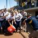 The Michigan softball team laughs after dumping water on head coach Carol Hutchins on Sunday, May 5. Daniel Brenner I AnnArbor.com